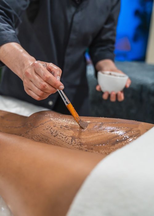 beautician-applying-chocolate-cream-on-woman-s-leg-2025-05-20-19-21-11-utc (1) beautician-applying-chocolate-cream-on-woman-s-leg-2025-05-20-19-21-11-utc (1)